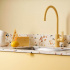Toniton x Beslag Design greb Hide i gul på køkkendøre